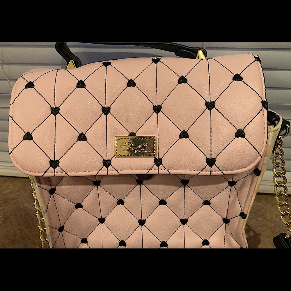 Betsey Johnson purse looks new